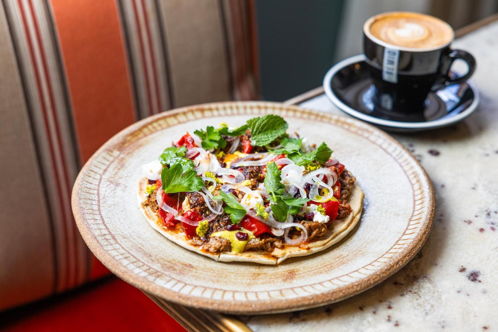فندق أوفولو ذا فالي بريسباين بريزبين المظهر الخارجي الصورة A vegan pizza at the restaurant